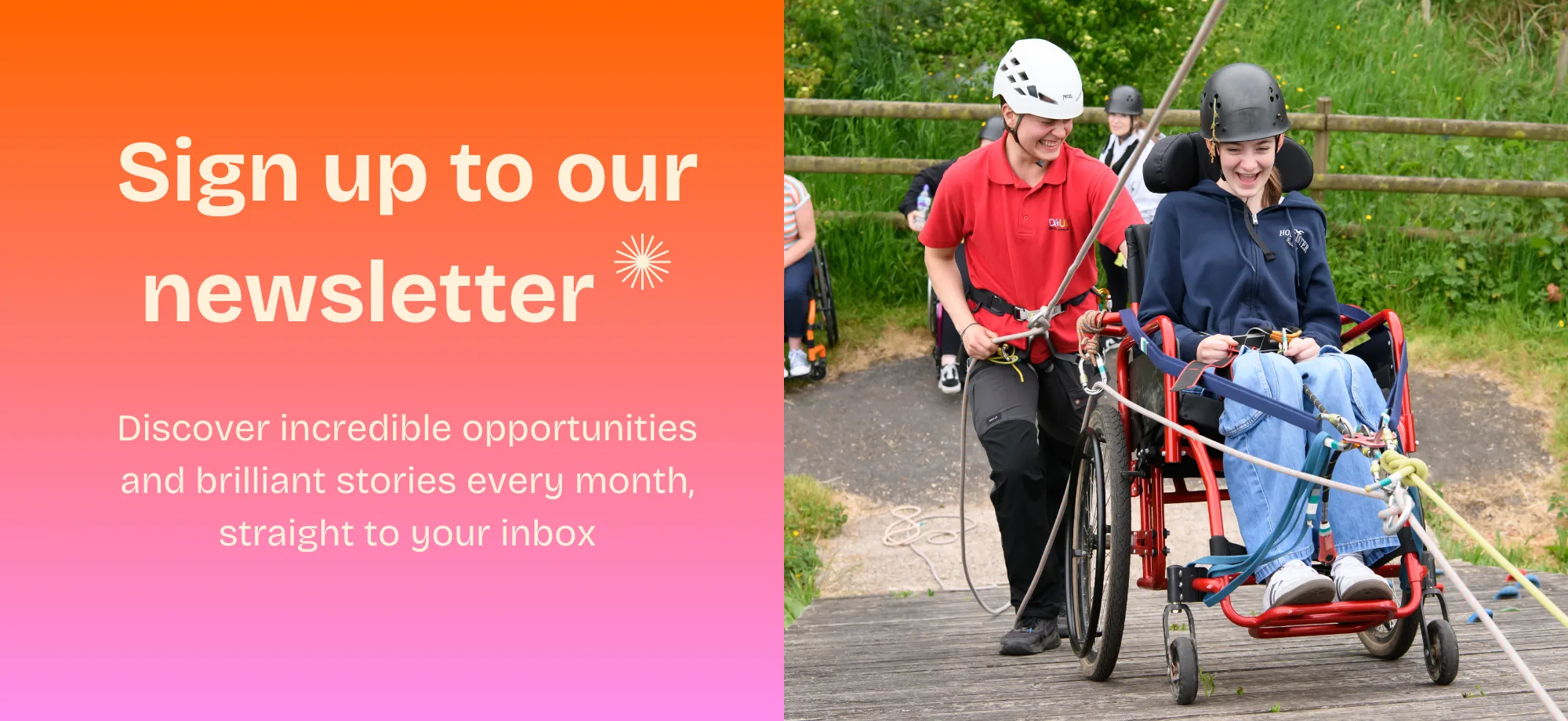 A young wheelchair user smiling during an outdoor activity